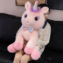 Schattige knuffel eenhoorn met strik – Zacht en magisch 3